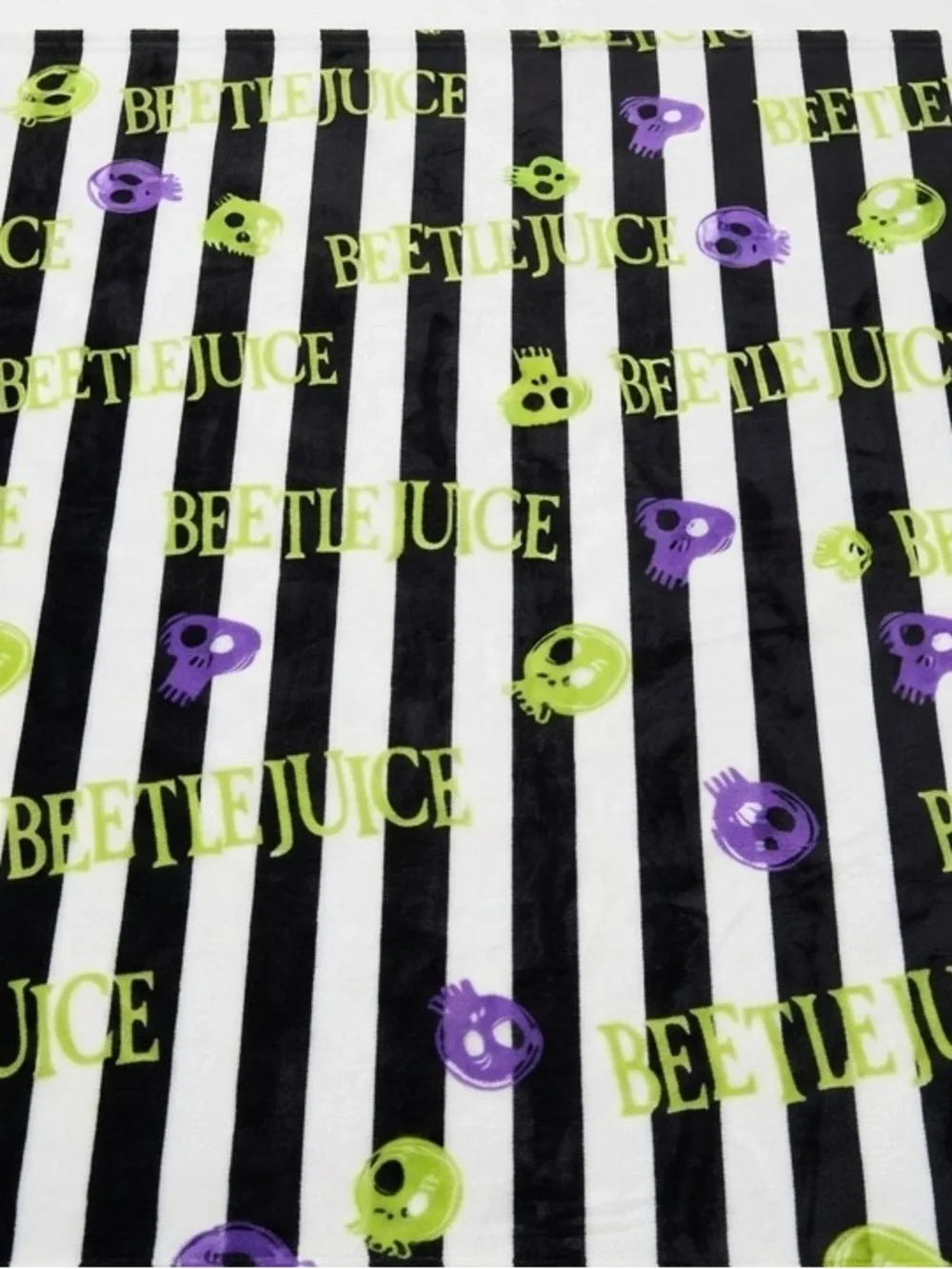 Beetlejuice Striped Skull Plush Throw
